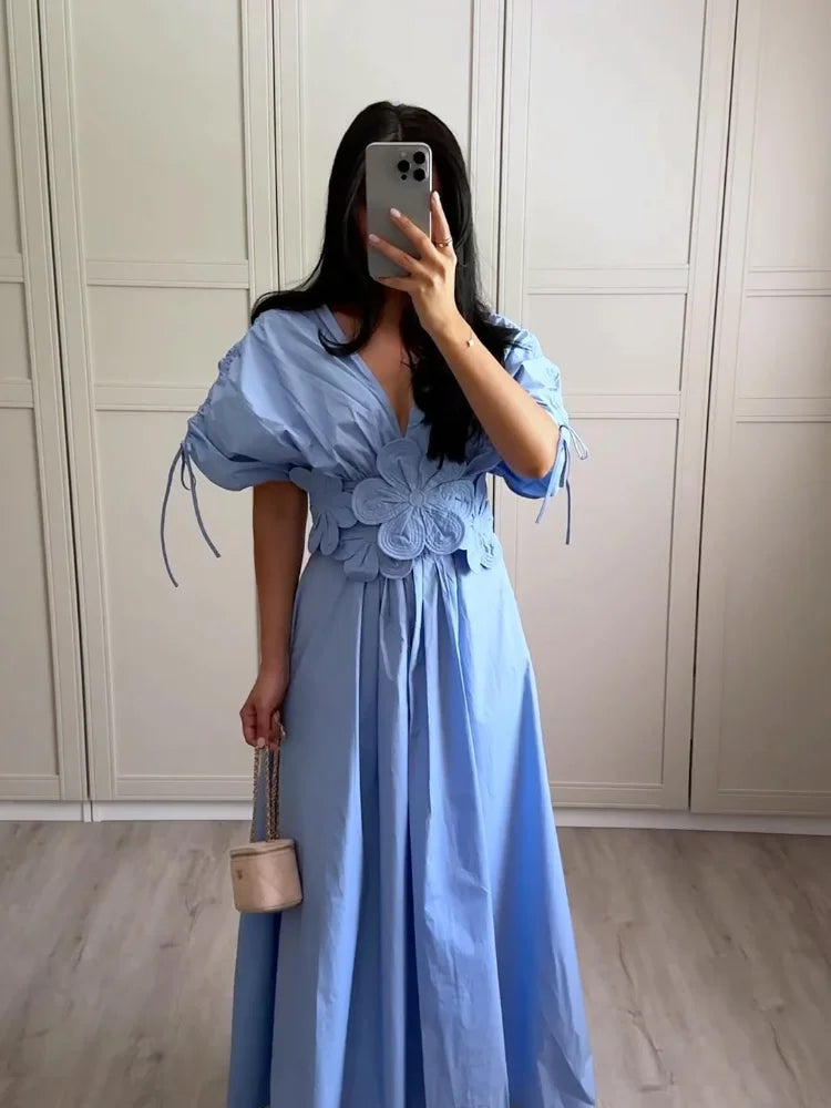 Vestido midi com flor - fluido novidade