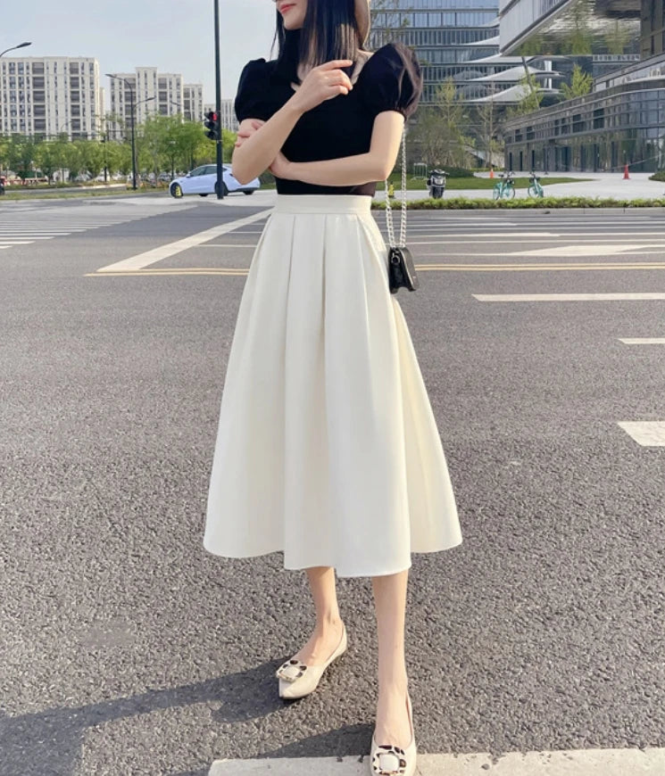 Saia Midi com bolsos alfaiataria