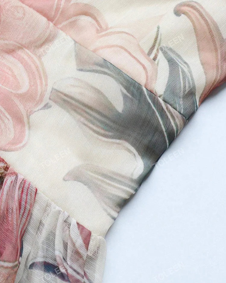 Vestido Longo Floral – Recortes Sofisticados, Manga Longa e Amarração nas Costas