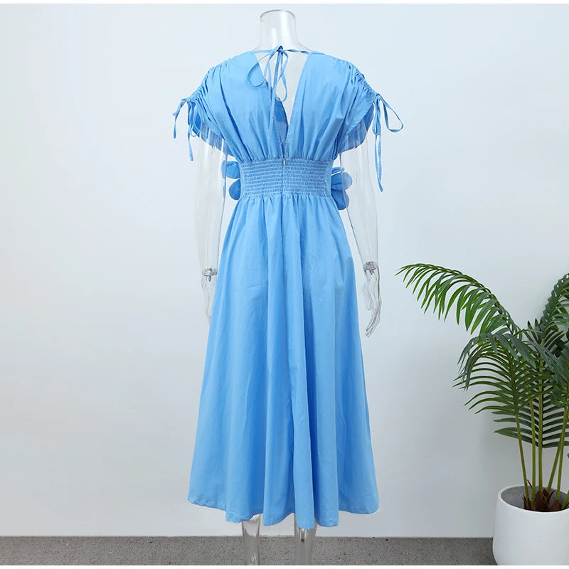 Vestido midi com flor - fluido novidade