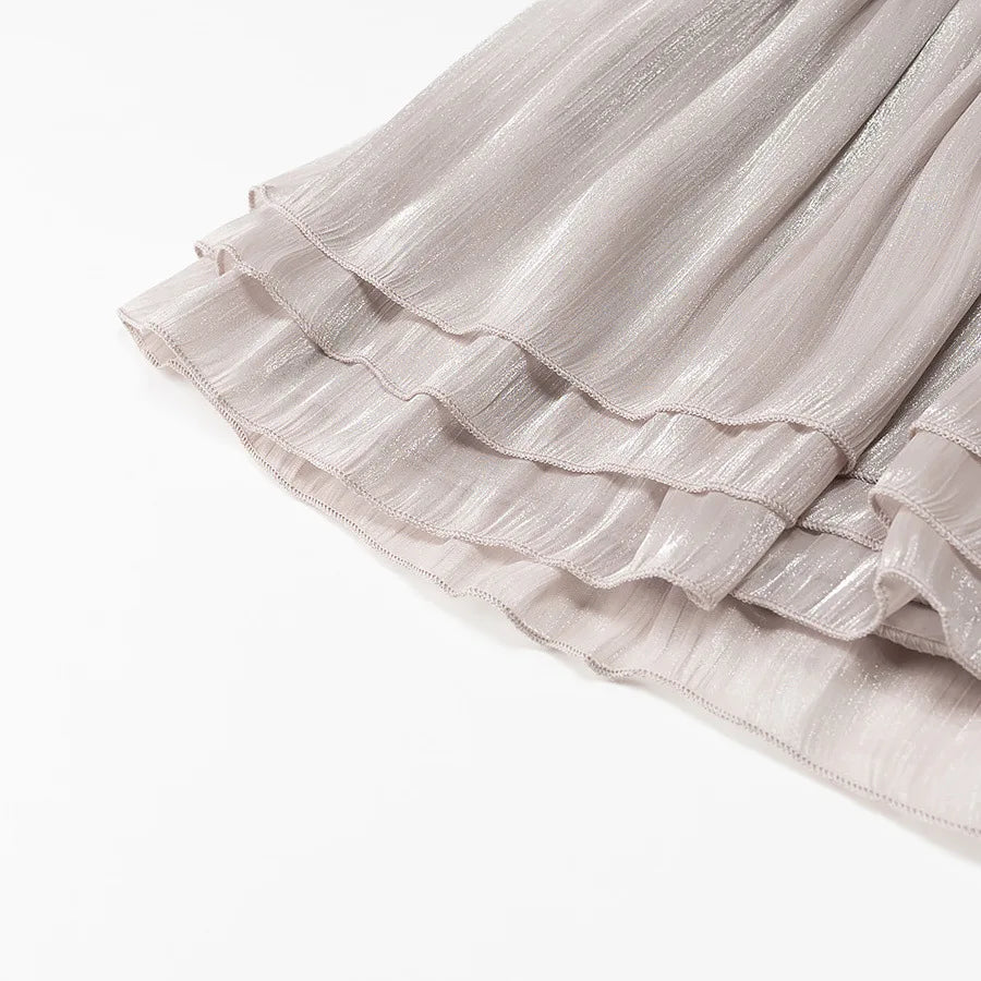 Conjunto Blusa e Saia Plissada - Brilho Sutil e Silhueta Moderna