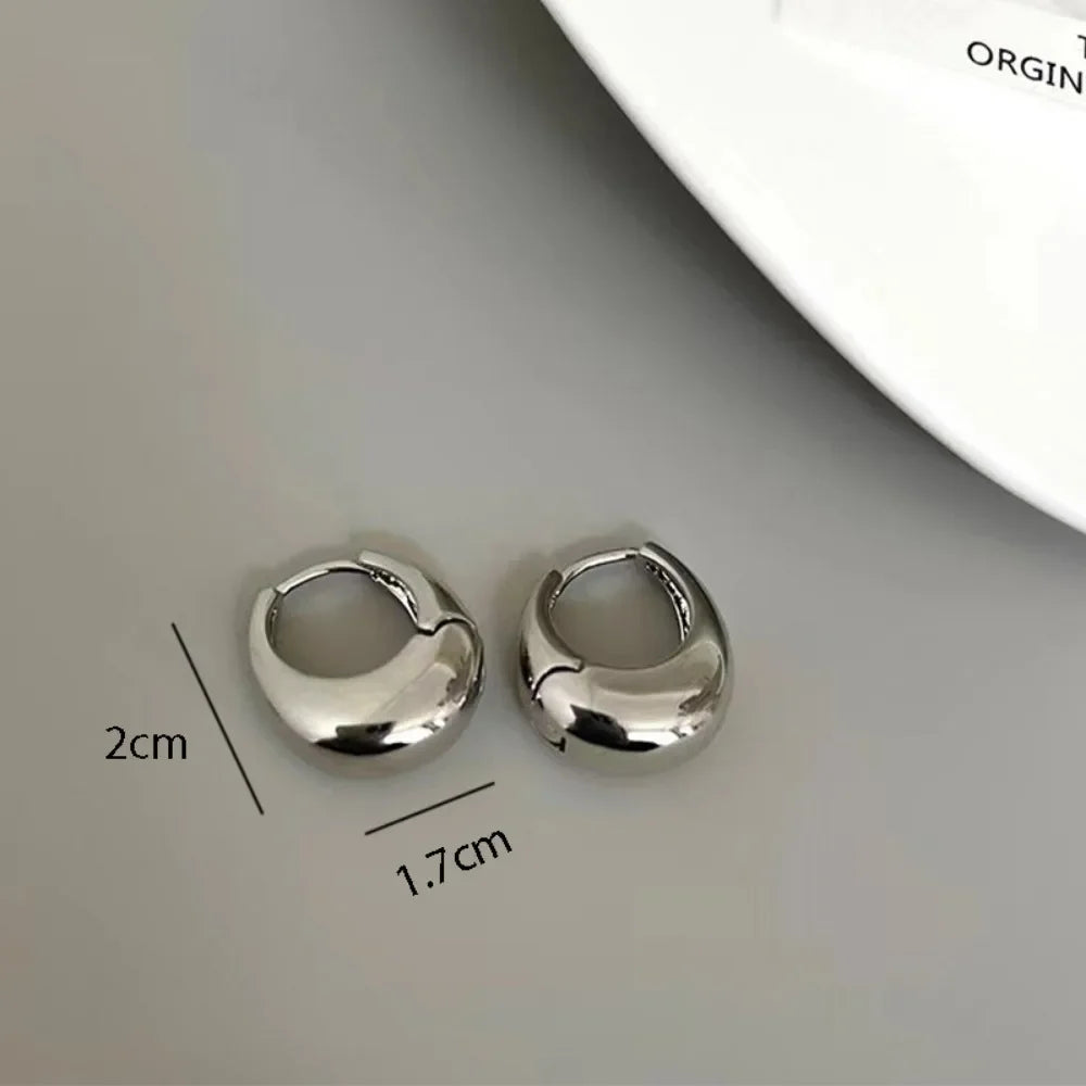 Argolas Grossas – Brilho Intenso em Aço Inoxidável