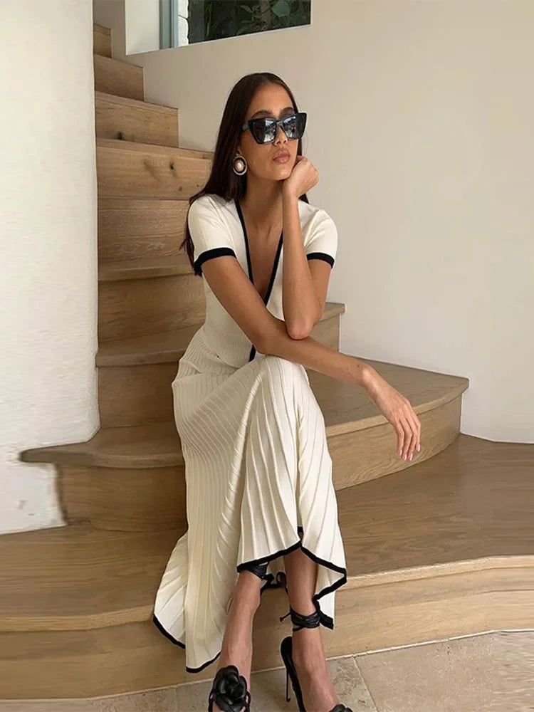 Conjunto Tricô - Saia Plissada e Cropped