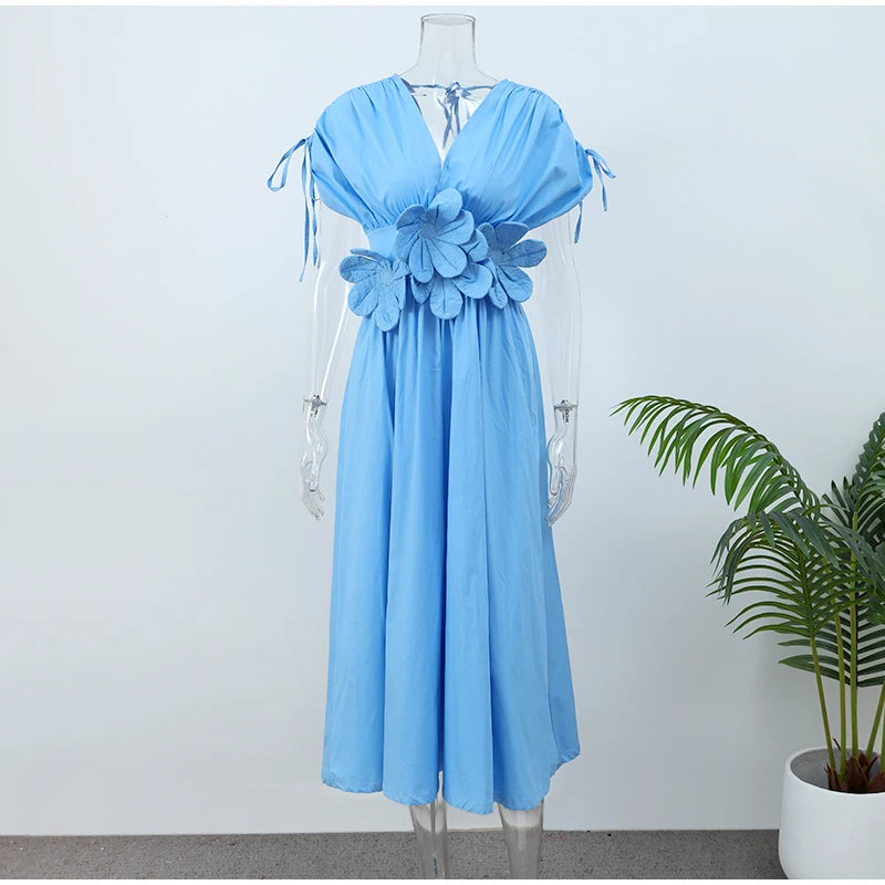 Vestido midi com flor - fluido novidade