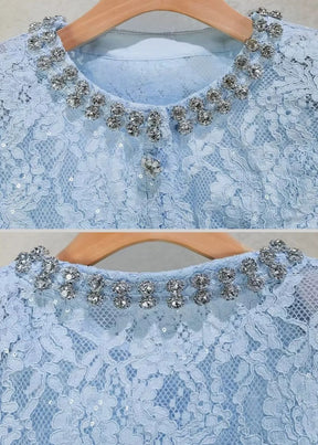 Conjunto Renda com Design Elegante – Blusa Bordada à Mão e Saia em Linha A