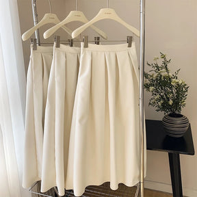 Saia Midi com bolsos alfaiataria