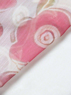 Vestido Longo Floral – Recortes Sofisticados, Manga Longa e Amarração nas Costas