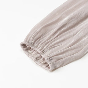 Conjunto Blusa e Saia Plissada - Brilho Sutil e Silhueta Moderna