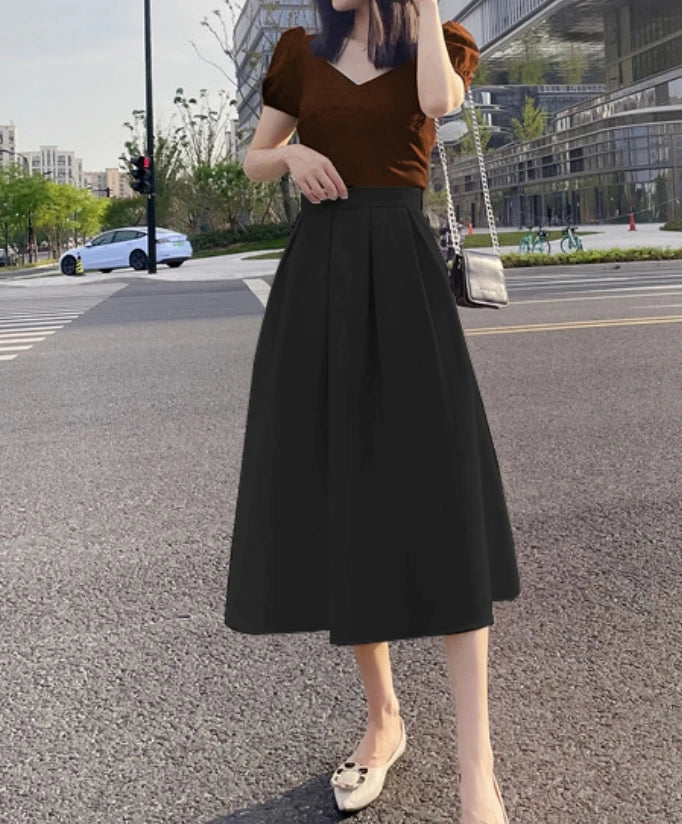 Saia Midi com bolsos alfaiataria