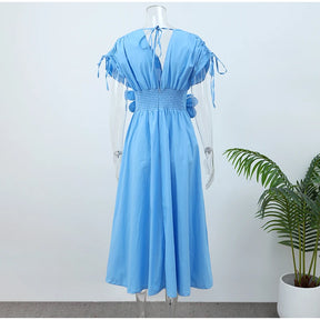 Vestido midi com flor - fluido novidade