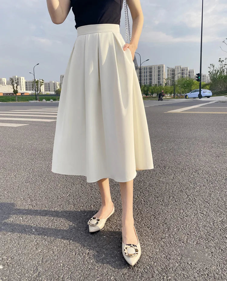 Saia Midi com bolsos alfaiataria