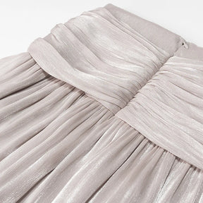 Conjunto Blusa e Saia Plissada - Brilho Sutil e Silhueta Moderna