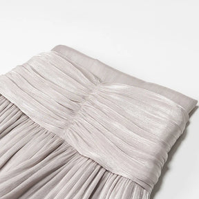 Conjunto Blusa e Saia Plissada - Brilho Sutil e Silhueta Moderna