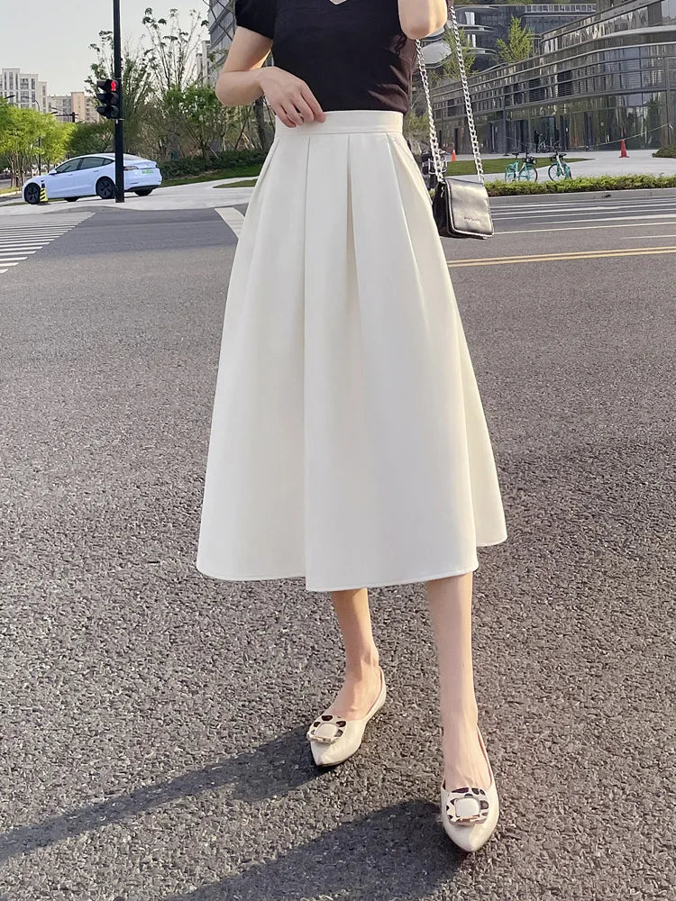 Saia Midi com bolsos alfaiataria